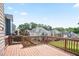 Spacious wooden deck perfect for outdoor entertaining with a neighborhood view at 180 Mirramont Lake Dr, Woodstock, GA 30189