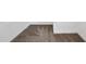 Neutral hallway with clean carpet and white base molding at 180 Mirramont Lake Dr, Woodstock, GA 30189