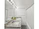 Bathroom featuring granite counters, bright lighting and a shower tub combo at 2324 Ithica Se Dr, Marietta, GA 30067