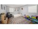 Cozy bedroom with toys, area rug, and plenty of natural light, perfect for a young  at 2324 Ithica Se Dr, Marietta, GA 30067