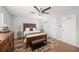 Comfortable bedroom with a ceiling fan, wood flooring and neutral paint, ready for relaxation at 2324 Ithica Se Dr, Marietta, GA 30067