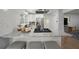 Stylish kitchen island featuring granite countertops, seating, and stainless steel appliances at 2324 Ithica Se Dr, Marietta, GA 30067