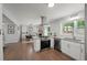 Open kitchen showcases stainless appliances, granite countertops, and a connected dining area at 2324 Ithica Se Dr, Marietta, GA 30067