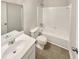 Bathroom includes a tub and shower combination with a single sink vanity at 2492 Wild Rose Cir, Lawrenceville, GA 30044