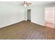 Spacious bedroom with modern flooring and a ceiling fan at 2492 Wild Rose Cir, Lawrenceville, GA 30044