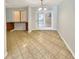 Dining room with ceramic tile flooring and sliding glass doors to patio at 2492 Wild Rose Cir, Lawrenceville, GA 30044