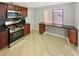 Updated kitchen featuring stainless steel appliances and a breakfast bar at 2492 Wild Rose Cir, Lawrenceville, GA 30044