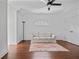 Bedroom features a comfortable sofa, hardwood floors, recessed lighting, and a ceiling fan at 4356 N Buckhead Ne Dr, Atlanta, GA 30342