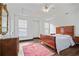 Spacious main bedroom with tray ceiling, beautiful floors, and great natural light at 4356 N Buckhead Ne Dr, Atlanta, GA 30342
