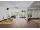 Spacious recreation room with hardwood floors, windows to the backyard, and recreation equipment at 4356 N Buckhead Ne Dr, Atlanta, GA 30342