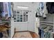 Walk-in closet with custom storage, shelving, and full hanging rods at 4356 N Buckhead Ne Dr, Atlanta, GA 30342