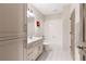 Clean bathroom with white vanity, tiled shower, and coordinated fixtures at 10635 N Edgewater, Johns Creek, GA 30097