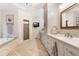 Bright bathroom featuring herringbone floors, a large tub, and a walk-in shower at 10635 N Edgewater, Johns Creek, GA 30097