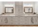 Bathroom with a double vanity, ample cabinet space, and modern fixtures for everyday comfort at 10635 N Edgewater, Johns Creek, GA 30097