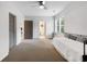 Bright bedroom with a daybed, carpet floors, and multiple doors at 10635 N Edgewater, Johns Creek, GA 30097