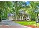Charming home with well-manicured lawn and brick driveway at 10635 N Edgewater, Johns Creek, GA 30097