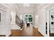 Elegant foyer with hardwood floors, staircase, and a view to the living area at 10635 N Edgewater, Johns Creek, GA 30097