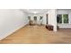 Large living room with multiple windows, hardwood floors, and seating at 10635 N Edgewater, Johns Creek, GA 30097