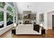 Cozy living room featuring a large window with backyard view and fireplace at 10635 N Edgewater, Johns Creek, GA 30097
