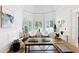 Bright home office with arched windows, hardwood floors, and neutral decor at 10635 N Edgewater, Johns Creek, GA 30097