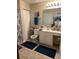 Bright bathroom with double vanity, tile floors, and linen closet at 1535 Duluth Hwy # 1101, Lawrenceville, GA 30043