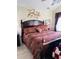 Comfortable bedroom with large bed, decorative wall art, and natural light at 1535 Duluth Hwy # 1101, Lawrenceville, GA 30043