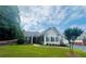 Inviting exterior view of home featuring a lush green lawn and well-maintained landscaping at 1535 Duluth Hwy # 1101, Lawrenceville, GA 30043