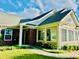 Attractive brick and siding home with a walkway leading to the entrance, featuring a sunroom at 1535 Duluth Hwy # 1101, Lawrenceville, GA 30043