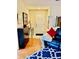 Inviting home entry featuring a hardwood floor, modern decor, and a view into the living space at 1535 Duluth Hwy # 1101, Lawrenceville, GA 30043