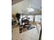 Open living room with tile flooring, piano, and vaulted ceilings at 1535 Duluth Hwy # 1101, Lawrenceville, GA 30043
