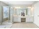 Bathroom with double vanity and a glass-enclosed shower at 4855 Payson Se Ter # 3, Atlanta, GA 30339