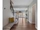 Inviting entryway featuring hardwood floors and staircase to the upper level at 4855 Payson Se Ter # 3, Atlanta, GA 30339