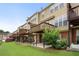 Exterior of complex showing decks and lawn at 4855 Payson Se Ter # 3, Atlanta, GA 30339
