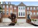 Charming brick townhouse with a two-car garage and beautifully landscaped front yard at 4855 Payson Se Ter # 3, Atlanta, GA 30339