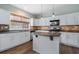 Updated kitchen showcasing a center island and modern stainless-steel appliances at 4855 Payson Se Ter # 3, Atlanta, GA 30339