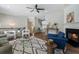 Stylish living room with fireplace, hardwood floors, and plenty of space for entertaining at 4855 Payson Se Ter # 3, Atlanta, GA 30339