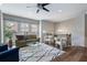 Bright and airy living room with hardwood floors, neutral tones, and stylish furniture at 4855 Payson Se Ter # 3, Atlanta, GA 30339