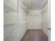 Spacious walk-in closet with carpet and wire shelving for optimal storage at 4855 Payson Se Ter # 3, Atlanta, GA 30339
