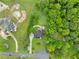 Aerial view of house with a private pool and a long winding driveway at 789 Rutland Ct, Lithonia, GA 30058