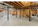 Unfinished basement with exposed ceiling and wood framing ready for a custom buildout at 789 Rutland Ct, Lithonia, GA 30058