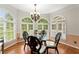 Cozy breakfast nook bathed in natural light from large windows, perfect for morning meals at 789 Rutland Ct, Lithonia, GA 30058