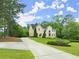 Charming two-story home with a long driveway and beautifully landscaped yard at 789 Rutland Ct, Lithonia, GA 30058