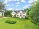 Beautiful home with a well-manicured lawn and mature landscaping at 789 Rutland Ct, Lithonia, GA 30058