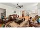Comfortable living room features elegant furnishings, hardwood floors, and seamless flow into the kitchen at 789 Rutland Ct, Lithonia, GA 30058