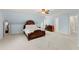Spacious main bedroom with a decorative bed frame and a large dresser at 789 Rutland Ct, Lithonia, GA 30058