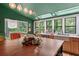 An eat-in kitchen with hardwood floors, an island, a farmhouse sink, and lots of natural light at 1033 Justice Nw Ln, Acworth, GA 30102