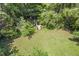 Large grassy backyard with a set of steps at 2190 Stephen Long Ne Dr, Atlanta, GA 30305