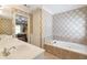 Spacious bathroom with a soaking tub and elegant fixtures at 2190 Stephen Long Ne Dr, Atlanta, GA 30305