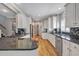Modern kitchen featuring granite countertops, stainless steel appliances, and ample cabinet space at 2190 Stephen Long Ne Dr, Atlanta, GA 30305