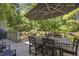 Enjoyable outdoor deck with ample seating and a serene view of lush greenery at 2190 Stephen Long Ne Dr, Atlanta, GA 30305